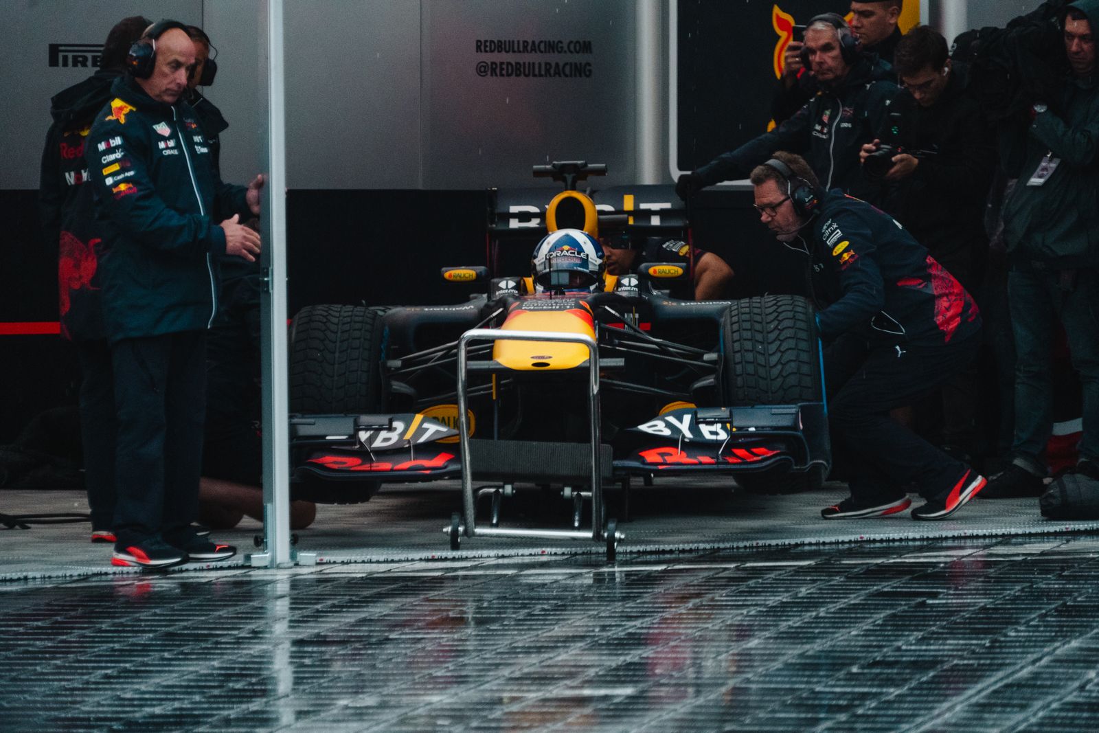 Formula 1 team working in the garage during a Grand Prix